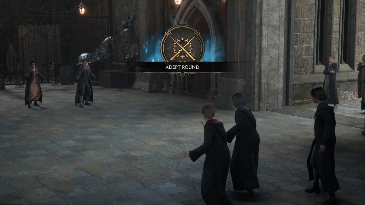 bacchette incrociate che duellano nel secondo round dell'eredità di Hogwarts