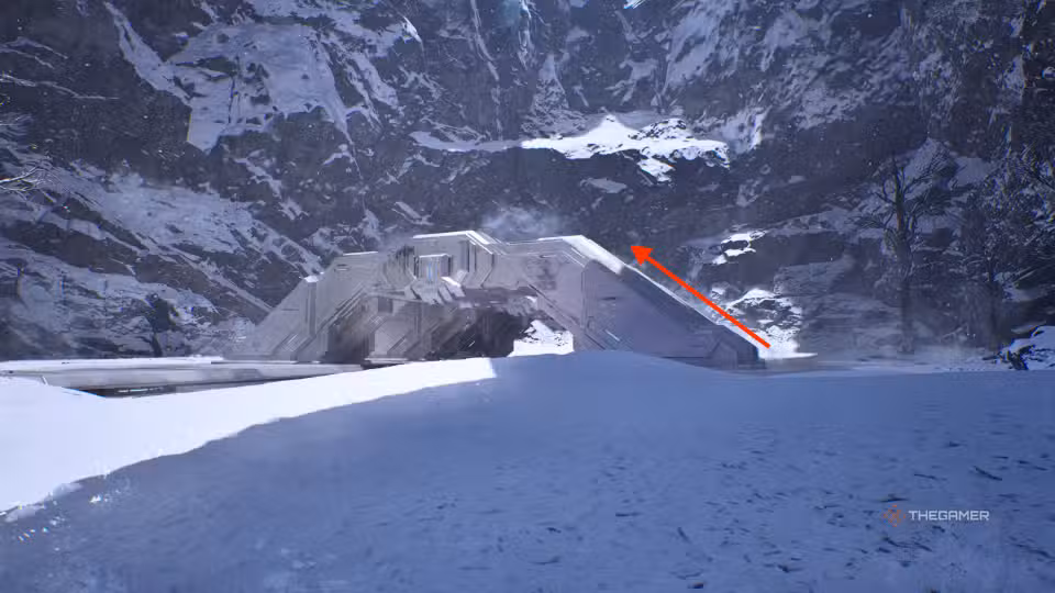 Arco di metallo con lo skull IWHBYD all'interno del buco di ghiaccio