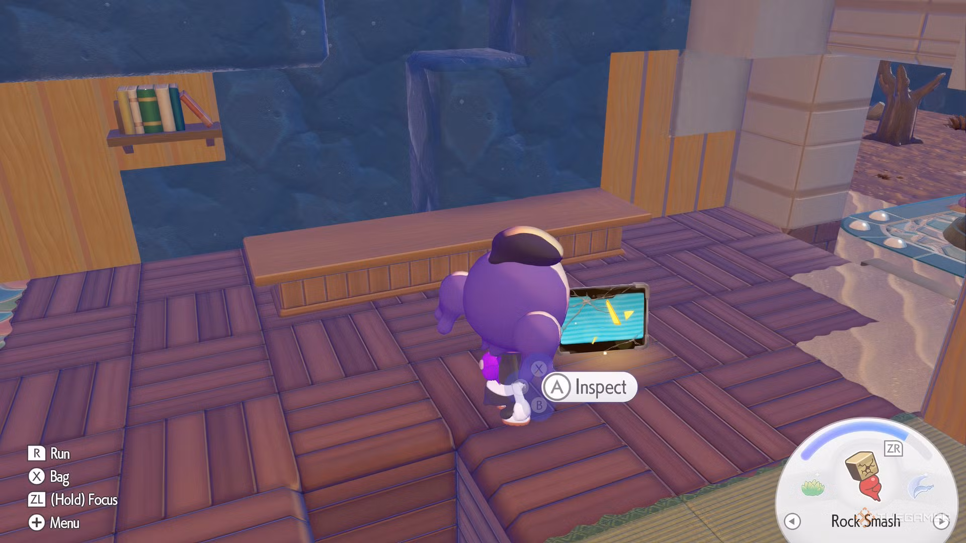 Ditto vicino a un tablet sul pavimento in Pokemon Pokopia